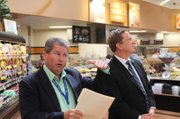 Rick Crandall, Supervalu's Director of Environmental Stewardship (left), and David Danielson, U.S. Assistant Secretary of Energy, at the Carpinteria Albertsons