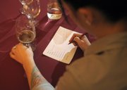 Eureka! Burger's Sarah Huska, a certified cicerone and judge for our Hoedown, jotted down tasting notes as she scored beers based on aroma, appearance, flavor, mouthfeel, overall impression, and "holidayness."