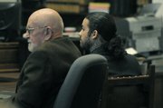 Adrian Robles and his defense attorney Steve Balash listen to the jury convict him of first-degree murder in the 2010 stabbing death of Robert Simpson