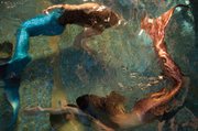 <b>MAGICAL:</b> Mermaids Linnea Kelley and Kaia Alexandria practiced their routine for the Lucidity Festival.