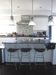 Among the many benefits of modular houses, this custom kitchen was installed in the factory.