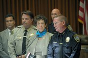 <b>FULL-COURT PRESS:</b> (from left) ATF agent John D’Angelo, Santa Barbara County Sheriff Bill Brown, Santa Barbara County District Attorney Joyce Dudley, and Lompoc Police Chief Larry Ralston held a press conference to announce the arrest of 15 alleged gang members. (June 7, 2014)