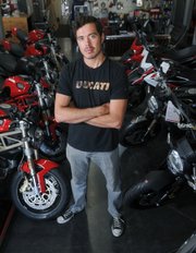 <b>MAKING HISTORY:</b> Five years ago, S.B. motorcycle racer Carlin Dunne (above) was a spectator at his first Pikes Peak Hill Climb. Now he is a three-peat winner of the race, this year achieving victory on an electric motorcycle.