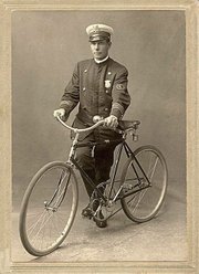 Stamford police officer Arnold Kurth poses with his bike, 1892.
