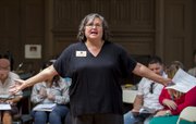 <b>GOOD COP, BAD COP:</b> Cathy Murillo (left) sought community input on nonpunitive solutions to gang violence in a forum cohosted by Rev. Art Stevens.