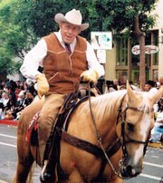 <b>RIDE ‘EM:</b> An expert horseman, Roy Wentz volunteered as an outrider in more than 50 Fiesta parades.