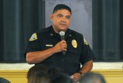 SBPD Officer Adrian Gutierrez speaks at the Community Action Commission Service Provider Summit addressing possible solutions to youth and gang related issues (July 29, 2013)