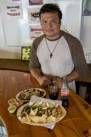 <b>FEEL THE BURN:</b> That’s a platter of goodness from Taquería La Colmena, slathered in an amazing peanut-habanero salsa.