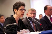 <b>NUMBER CRUNCHER:</b> Panelist Judy Heiman from the Legislative Analyst’s Office talks budget figures.