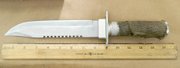 Police say Tacadena was wielding this military-style survival knife as he strode toward the officer.