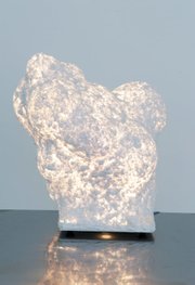 Ball-Nogues Studio’s “Music Legs Glob Lamp” is pulped paper and a lightbulb on a wooden base.
