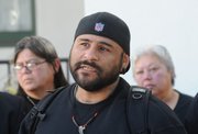 Activist Martin Leyva speaks during the press conference announcing the Brian Tacadena wrongful death claim