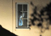 The man barricaded in his Bath Street residence was seen through a window yelling to SWAT as they tried to enter the building at 12:45 a.m.