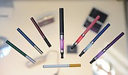 <b>RANGE OF OPTIONS:</b> Some e-cigarettes — both disposable and rechargeable — are shaped like their traditional counterparts. Others are larger and more intricate.