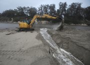 Crews dug a trench east of Goleta Beach to release flooding in the slough, airport, and surrounding areas.