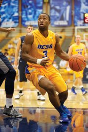 <b>FLEET FEET:</b> Junior point guard Zalmico Harmon (#3) — known as “Z” — is a UCSB player with a high degree of basketball intelligence. His assist-to-turnover ratio of 4.69-to-1 is the second-highest in NCAA Division 1, and
Harmon was honored as Big West 2014 Hustle Player of the Year.