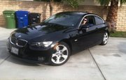 This Facebook photo shows Elliot Rodger in a black BMW with the same license plate number found on the suspect's vehicle in the Isla Vista shooting