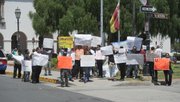 Taxi drivers protest at De la Guerra Plaza the unfair business rules involving ride sharing companies Uber and Lyft.