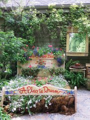 <b>CENTRAL COAST DAYS:</b> Cambria Pines Lodge is peppered with tranquil gardens, like this whimsical one laid out within a bedroom set.