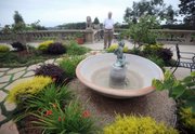 In addition to drought-resistant landscaping, Larry Reiche has turned off his fountains.