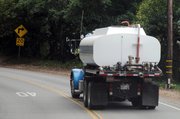Dozens of Montecitans are trucking in water daily to circumvent rationing measures imposed by the Montecito Water District. The district has the right to shut off water to residents who repeatedly exceed their monthly drought allocations.