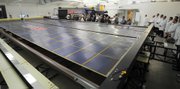 This Roll-Out Solar Array (ROSA) model developed by Deployable Space Systems puts out 25 kilowatts of electric power and may one day support missions to Mars