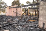 Described as the Pro Shop at the former Ocean Meadows Golf Course, and clearly outside the construction project site, the structure was completely destroyed.