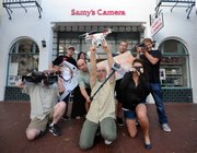 The crew or Samy's with their favorite toys outside the new location at 530 State Street.