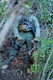 A law enforcement officer with the U.S. Forest Service, who wished to remain anonymous, and his K-9 partner