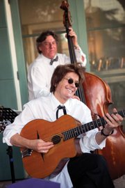 <b>HOT: </b> Dave Collert played his favorite Jacques Favino guitar with his Hot Club Band in 2013.