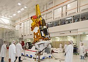 Astro Aerospace engineers test and inspect their deployable radar system before launch.
