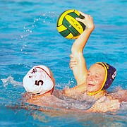 Dos Pueblos’ Olivia Kistler gets sandwiched by San Marcos defenders Paige Hauschild and Brittany Prentice.