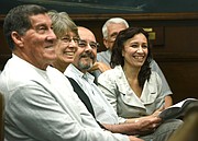 The lawsuit's plaintiffs were all smiles Monday as the district boundaries were unveiled