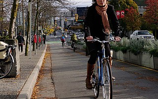 A bike lane separated from cars adds safety in Vancouver, Canada.