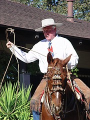 <strong>COWBOY UP: </strong>Pat Puckett gives a roping demonstration at the Vaquero Show & Sale Celebration.