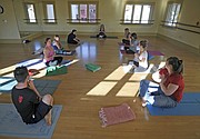 Jessica Parsons, a certified yoga instructor born with down syndrome leads the Inclusive Yoga for All Abilities class at the Carrillo Rec Center (May 15, 2015).