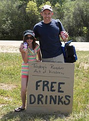 <strong>MAKE HAPPY:</strong> Leon Lewandowski and his daughter, Maya, encourage all to practice kindness in April.