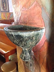 Four renovated holy water fonts, believed to have been carved in 1820 by Chumash artists.