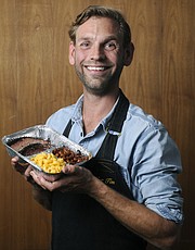 Neighbor Tim Goebel shows off his barbecued brisket served with snappy/smoky baked beans and the classic mac 'n' cheese for the Santa Barbara Independent's 7th Annual Sizzling Summer BBQ Contest