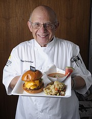 George Levinthal shows off his plate of Grilled watermelon Gazpacho w/ cool cucumber and spicy jalape–o followed by Kick-Ass Cheeseburger. Complementing the burger will be a tangy, mustard and vinegar based potato salad for the Santa Barbara Independent's 7th Annual Sizzling Summer BBQ Contest