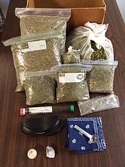 The hunt for a probation violator led to four drug- and weapon-related arrests in the City of Santa Maria.