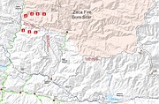 Map shows the area is which the fire was active Thursday night and containment lines which firefighters hope will contain the fire as it pushes east.