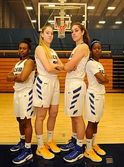 <b>NEW SKYLINE:</b> Guards Makala Roper (far left) and Onome Jemerigbe (far right) flank UCSB’s new 6'4" post players, Natalia Bruening (second from left) and Drew Edelman.