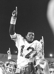<b>ALWAYS A DON:</b> Randall Cunningham was hoisted by his Santa Barbara Don teammates after his heroics in the final minute lifted them to a 15-14 victory over Dos Pueblos in 1980.