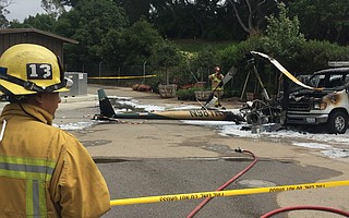 An R44 Robinson helicopter made an emergency landing at La Cumbre Country Club. Pilot and three passengers walked away, but an ensuing fire burned the aircraft and two parked vehicles just 10 feet from a fueling station.