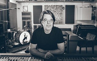 Eric Ambel behind the board at his recording studio, Cowboy Technical Services in Brooklyn.