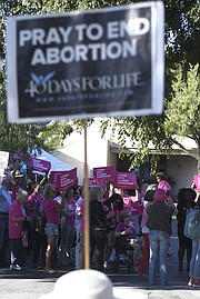 A Planned Parenthood rally on the 500 block of Garden Street with protesters gathered across the street