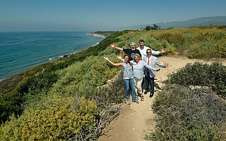 Clockwise from top left, artist Arturo Tello, the Land Trust’s Chet Work, Carpinteria City Councilmember Wade Nomura, and the Land Trust’s Carrie Mullen and Jennifer Stroh announce the purchase of 21 acres of Carpinteria Bluffs to be turned over to Carpinteria as a public open space and nature preserve.