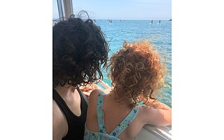 Author Talya Meyers (left), with daughter Jordan, aboard Lil’ Toot