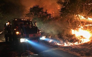 About 70 firefighters from Santa Barbara County fire districts are currently deployed across California, including this S.B. City Fire engine company in Napa.